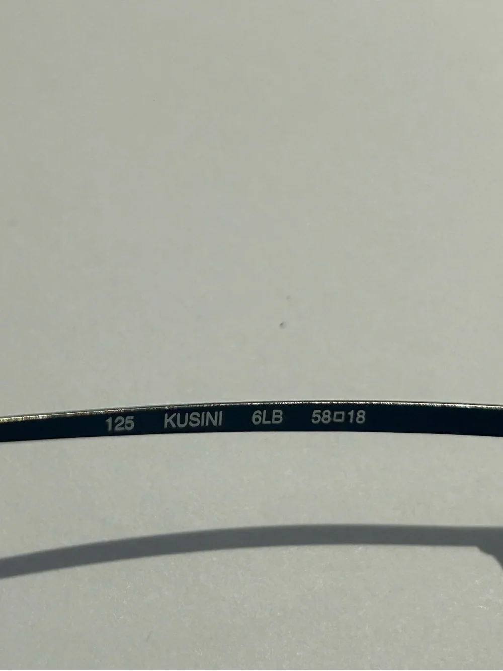 Diesel Gunmetal Frame Blue Gradient Lens Rimless Sunglasses -Kusini
